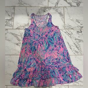 Lilly Pulitzer swimsuit cover up with cute ruffle details in the bottom.